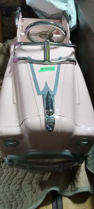 Beautiful Pretty in Pink pedal car in great condition, located Paris Ont, pick up only