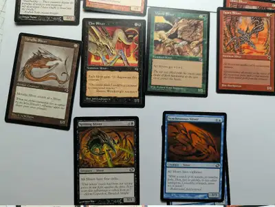 Going through my Magic the Gathering collection I found 17 assorted classic Slivers. All cards are i...