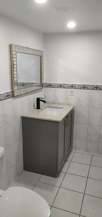 Extremely well connected to daily essentials, this two-bedroom plus 1 full washroom basement apartme...