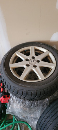 16"  Honda OEM rim with 4 nearly new BF Goodrich Radial Tire
