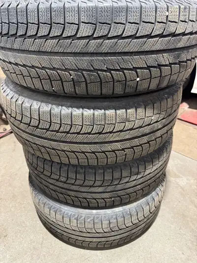 Michelin Lattitude X-ice 225/65/17 Tires are in good condition still and a lot of life left. (See ph...