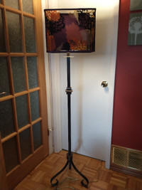 Floor lamp w/ decorative fabric shade.