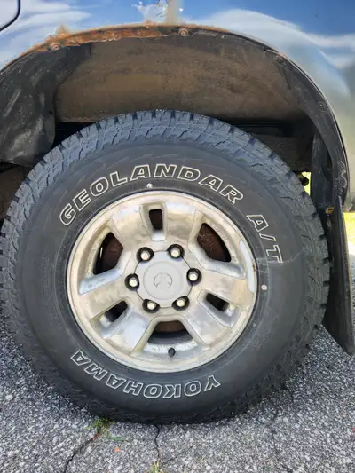 4 Goodyear nordic winter tires on BLACK STEEL toyota tacoma rims 75% tread left. 250$ 4 30x9.5r15 yo...