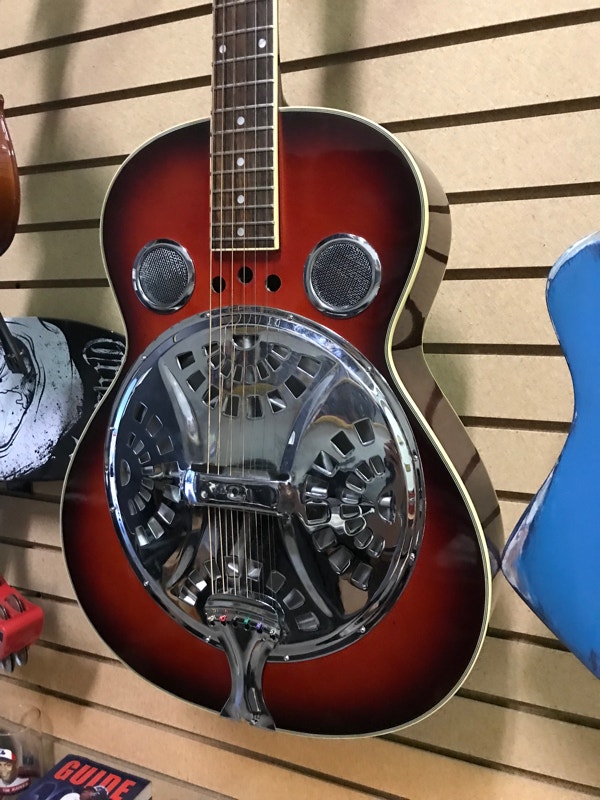Resonator guitar, made by Laredo. Setup for slide play 200 Guitars