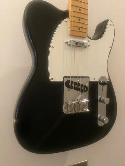 “A 1997 Squier "Gold Label" Telecaster is an uncommon and generally well-regarded late-90s model fea...