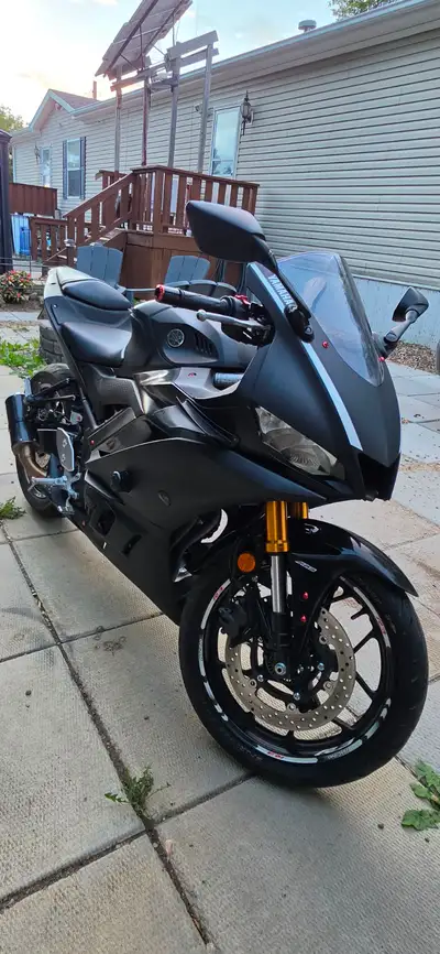 This Yamaha R3 is a reliable sport bike in good condition, featuring a sleek matte black finish and...