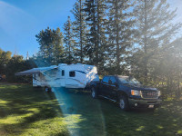 Zinger 27 ft travel trailer and GMC Sierra HD 4x4