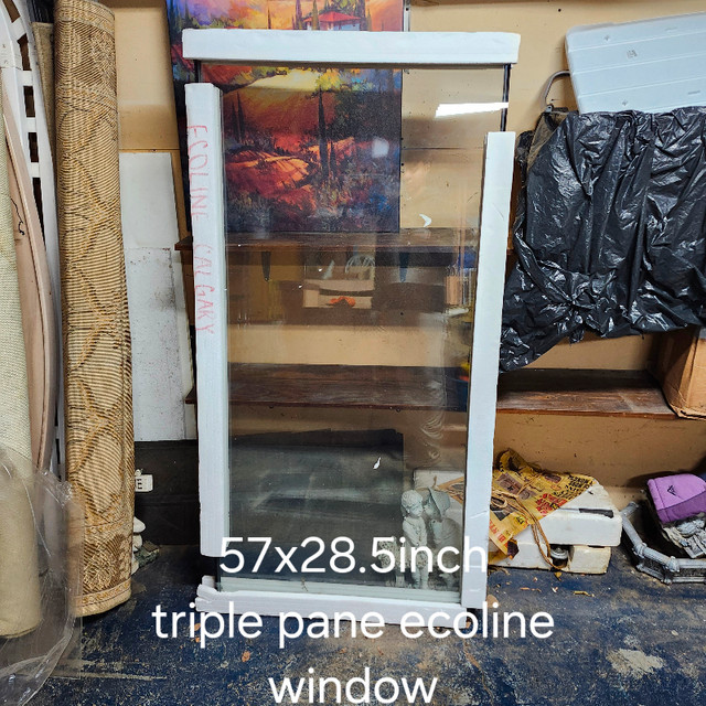 57 X 28.5 in TRIPLE PANE WINDOW in Windows, Doors & Trim in Medicine Hat