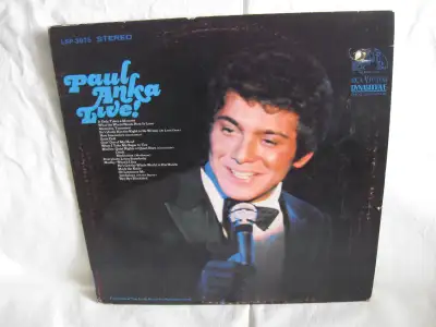 good condition light surface noise overall plays fine live recording performed at The Royal Box in t...