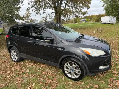 2013 Ford Escape SEL AWD with 274,396 km. Equipped with a 2.0L EcoBoost engine and panoramic sunroof...
