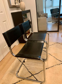Free: Two black  Bauhaus-style dining chairs