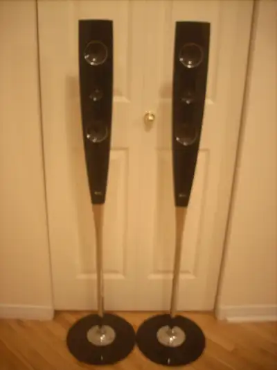 LG free standing black speakers; 4 ohm impedance, 100 watt rated input power, 200 watt maximum input...