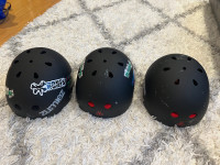 3 helmets skateboarding. 