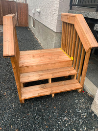 Deck landing with stairs and railing
