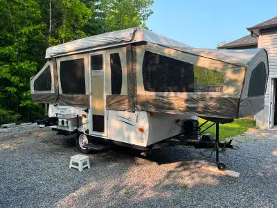 The pop up tent trailer sleeps 6 with a 48" x 80" rear bed and a 60" x 80" front bed that have heate...