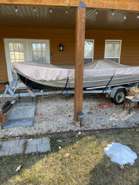 14 ft Aluminum boat and trailer and 9.9 motor