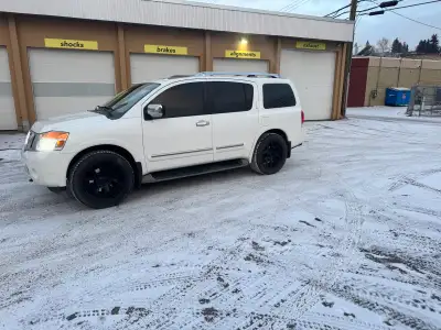 2010 Nissan Armada Platinum, Selectable 2wd, Auto,4wd high and low. Heated seats and steering. 7 pas...