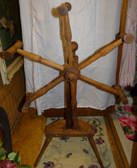 Antique yarn spinning wheel