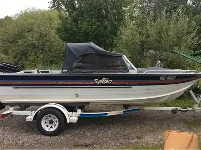 Bateau Sylvan 1987 18 pieds avec moteur Mercury 2 temps 75 forces 1993 avec trailer, raison de vente...