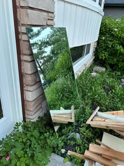 Free mirror , just removed from washroom Reno. No cracks