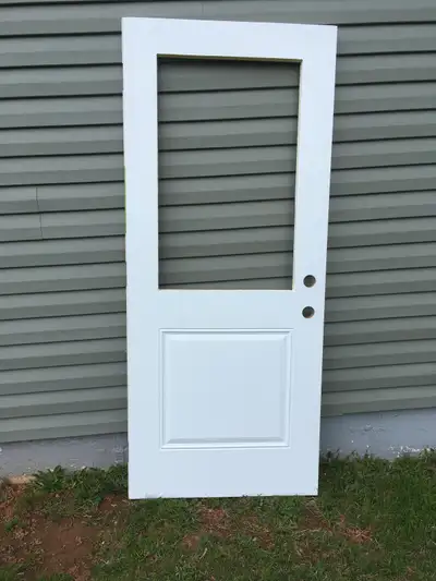 Steel door 79x33 1/2 needs glass insert 37x23 Door was never used. I bought the wrong size..
