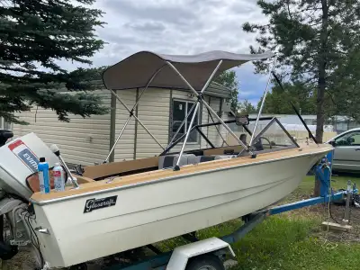 70 hp Evinrude Fish finder, Compass, Marine Horn, Marine Bluetooth radio with hoodio ,marine speaker...