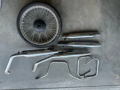 Exhaust (05 softail), bag guards ( unknown), bars (05 Heritage), 21” front wheel ( unknown, was on 2...