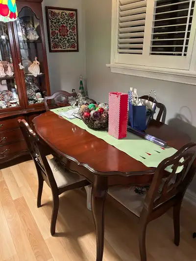 Beautiful vintage French-style dining table made of solid cherry wood, in excellent condition. Inclu...