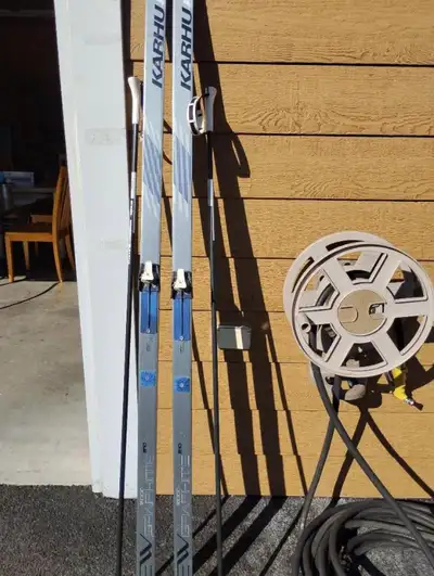 cross country skis, with poles; skis are 80" long by 2" wide
