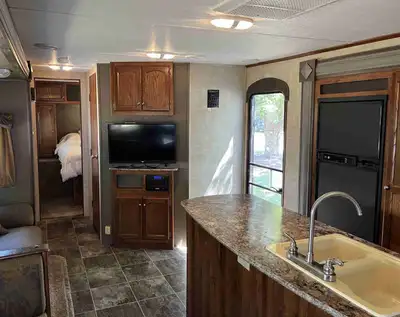 Great condition RV 2016 with 3 slides, kitchen island, bunkhouse with 3 bunks and lots of storage, o...