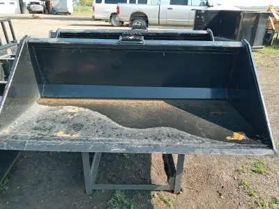 New! KC 66" Skidsteer smooth edge bucket. $1600 fixed 66" tooth bucket $1700 Contact 204-384-6523