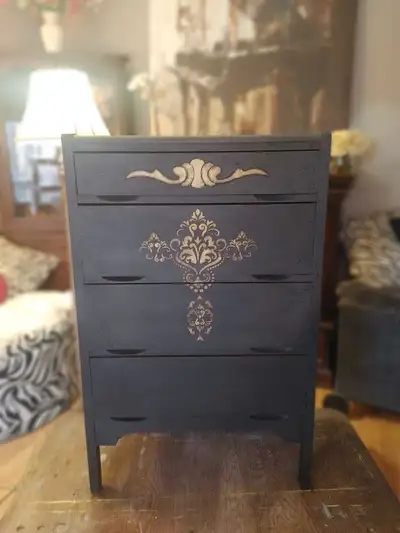 Dark grey painted finish. Gold accents. Four drawers. Crackle finish. Unique vintage piece. Excellen...