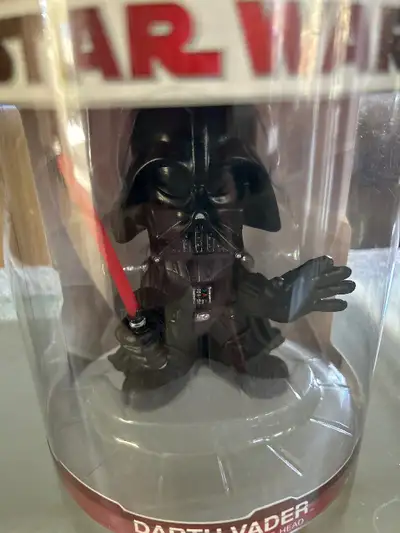 New 2009 Star Wars Darth Vader Ultra Stylized Bobble-head Funko. Please see my other ads.