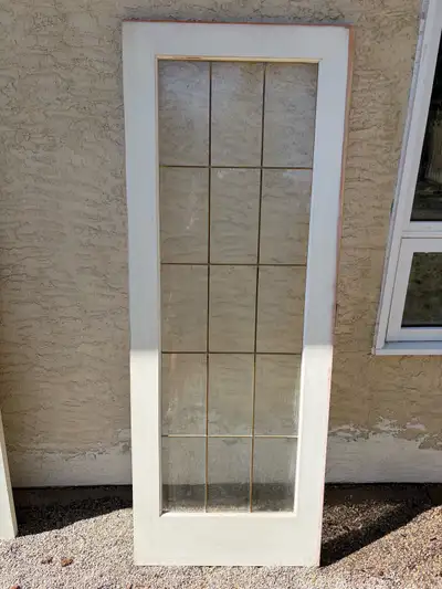 30”x 80” 1- glass insert pocket door. Must be picked up