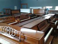 We sell real pianos--no keyboards !!