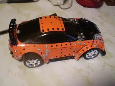 No controller. For parts only. Checking on-line picture body seems complete. Radio controlled chassi...