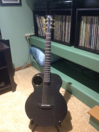 Enya Carbon Fiber Guitar with case