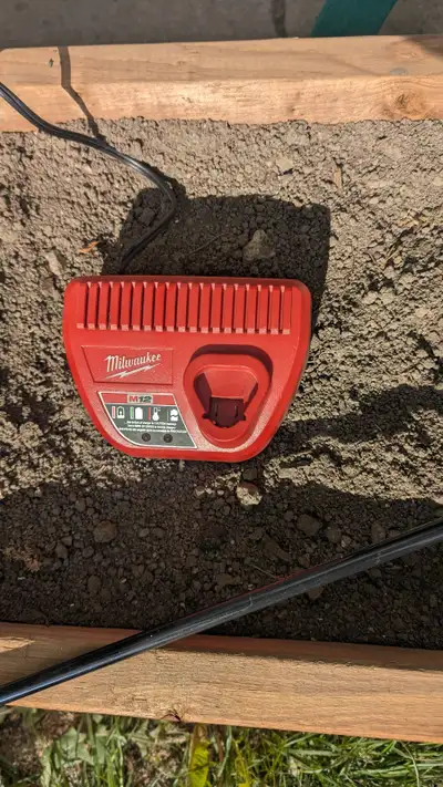 MILWAUKEE M12V BATTERY CHARGER, View more