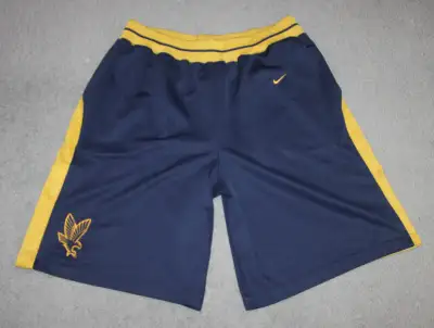 NIKE GAME WORN NCAA MARQUETTE GOLDEN EAGLES BASKETBALL SHORTS, View more