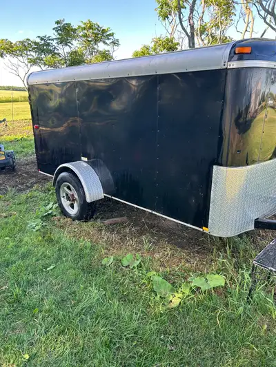 This 5x10 enclosed trailer from TNT is a reliable, pre-owned option perfect for hauling your gear, f...