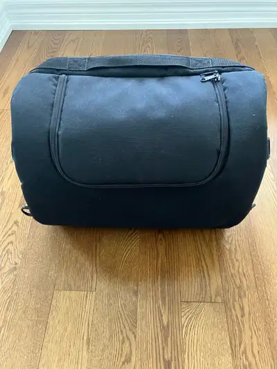 Harley Davidson touring bag Slides onto a rear backrest if you have one Internal lining to keep your...