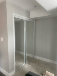 Mirrored sliding closet doors 