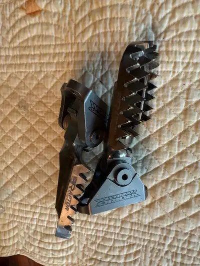 Used Raptor Apex Titanium footpegs with Works Connection mounts. $850 new. $425. Will fit pretty wel...