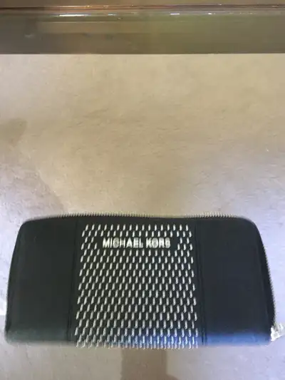 Black  Designer leather Michael Kors Wallet in mint condition, View more