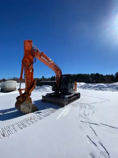 2021 Hitachi ZX135 excavator with Wide tracks, blade, H&H thumb, 36 inch heavy duty digging bucket,...