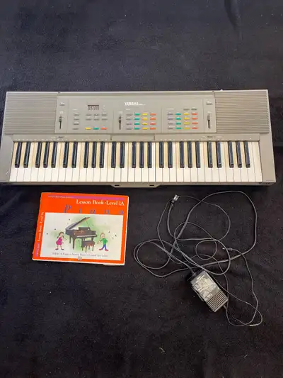Yamaha Electric Keyboard, View more