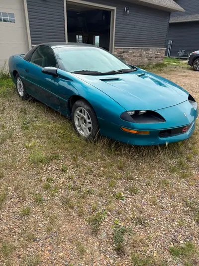 1994 Camaro Z28, 5.7 LT1. Auto. 205,000 kms. 2 new rear tires. Engine had been rebuilt by previous o...