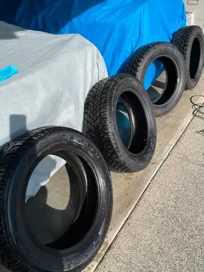 Set of 4 like new Studded Goodyear Ultra Grip Winter tires 245/55/R19 only used for couple months th...