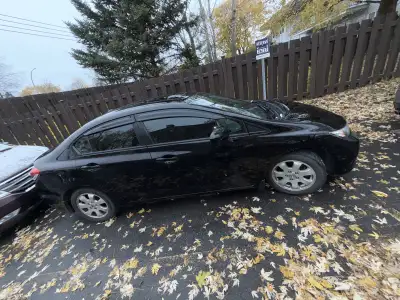 Honda Civic Touring 2015 noire, intérieur cuir, mode sport, toit ouvrant, caméra de recul et caméra...