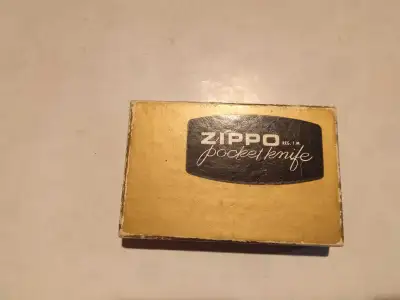 Check out this vintage Zippo knife with Wisers Deluxe branding, a true piece of collectible history...